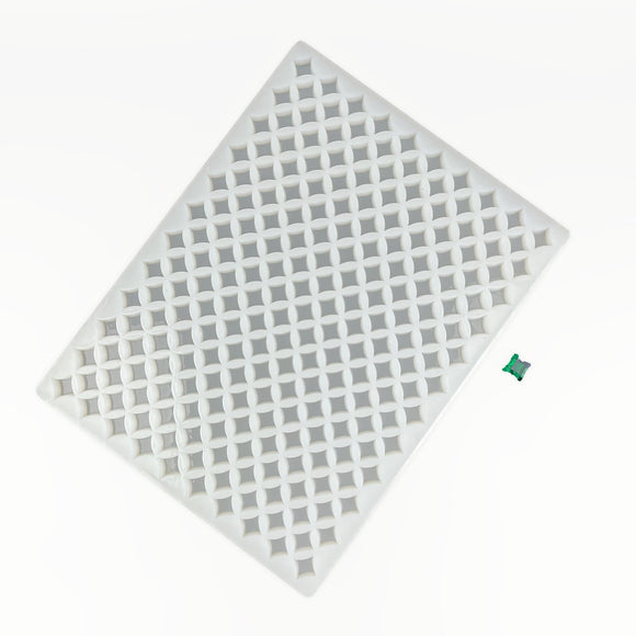 Full angled view of the 2mL Star Gummy Mold with 219 cavities and one emerald green gummy