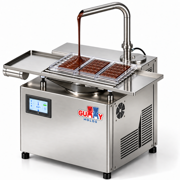 Gummy Molds chocolate tempering machine dispensing tempered chocolate into polycarbonate chocolate bar molds